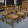 Ensemble de 6 chaises de salle à manger en chêne assise en jonc et dossier 'Echelle' dans le goût de GUILLERME ET CHAMBRON 1950s