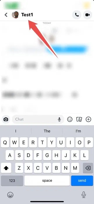 Tapping the group chat name in the Snapchat app.