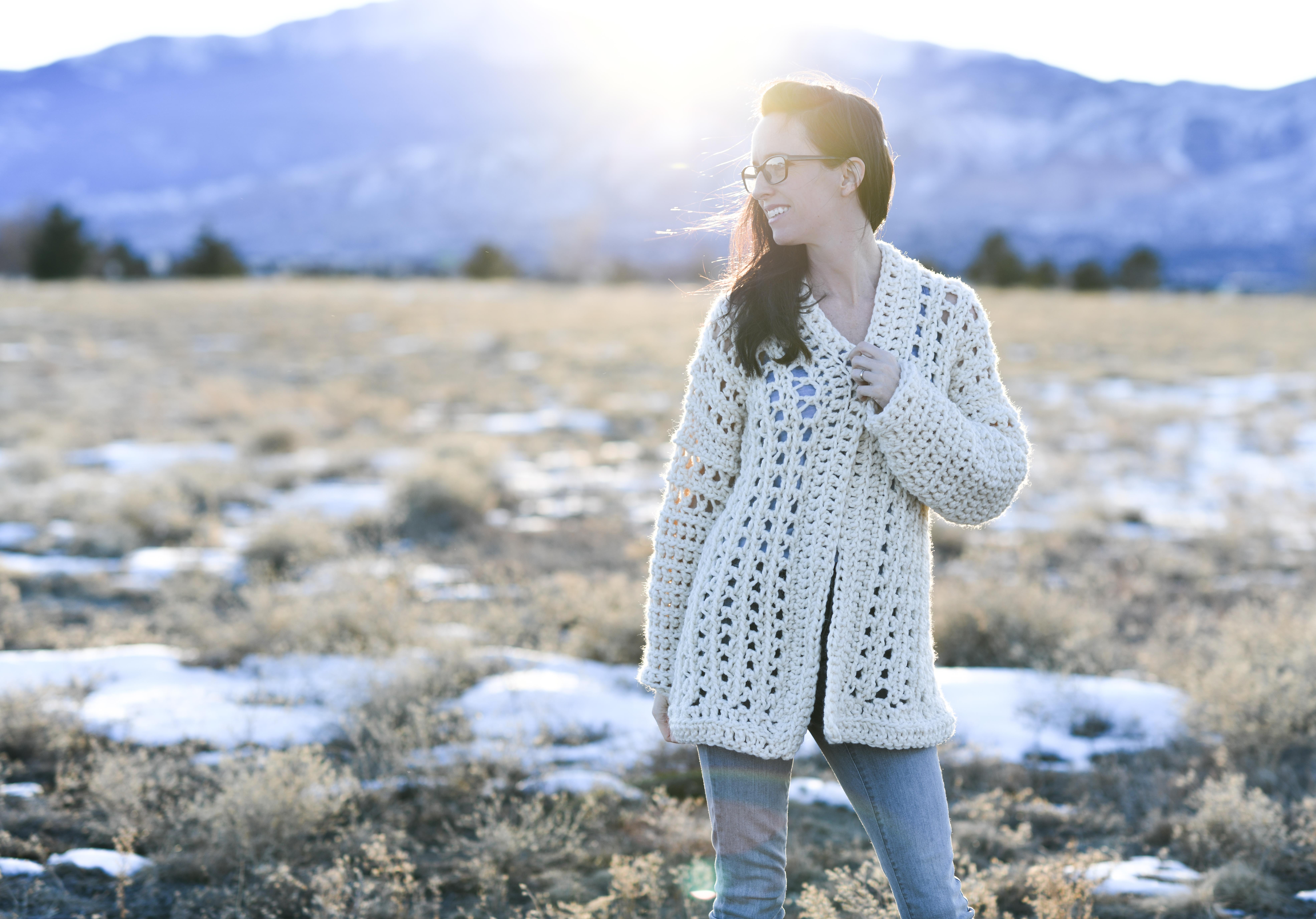 The collar neck and ribbing hem add a touch to the coat. Light Snow Oversized Cardigan Crochet Free Pattern Mama In A Stitch