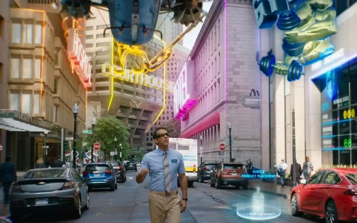 Man walking down the middle of a street while computer-generated flying objects speed by him.