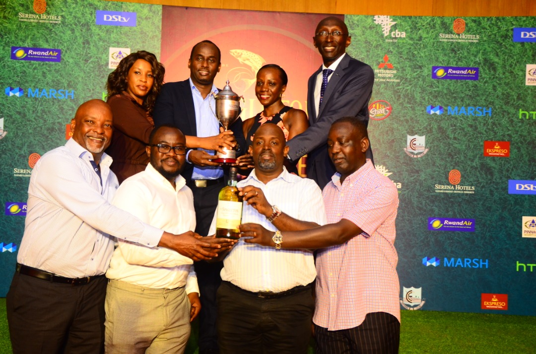 L-R: John Kato CEO Ekspresso, Centrics representative, Marvin Kagoro Vice Golf Captain Entebbe Club, Edwin Tumusiime Captain Entebbe Club. PHOTOS BY ASIIMWE VINCENT SMOKY/Matooke Republic.