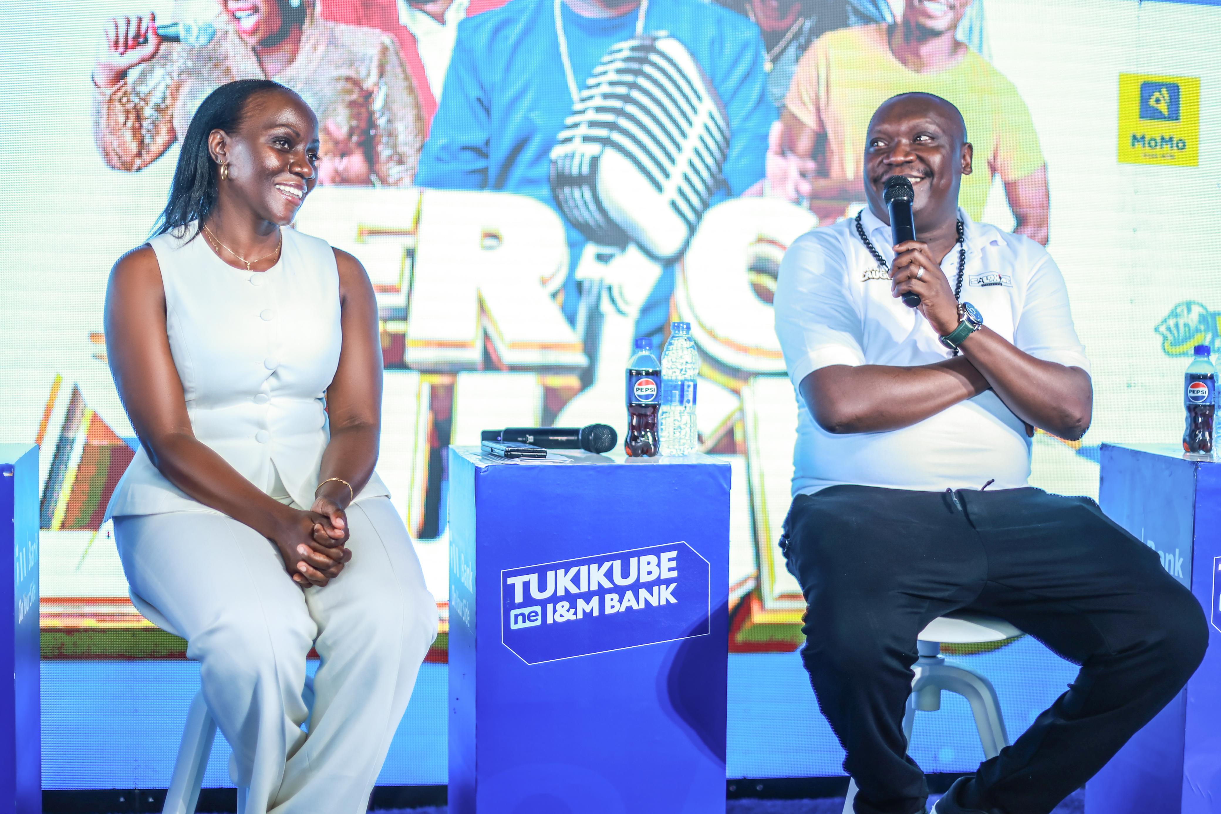 Salvador (right) addresses media as I&M Bank Head of Marketing and Corporate Communications, Annette Nakiyaga looks on.