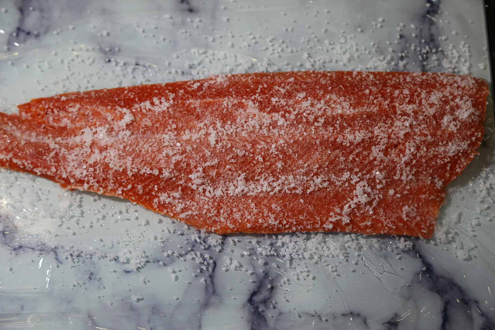 Coating salmon with salt