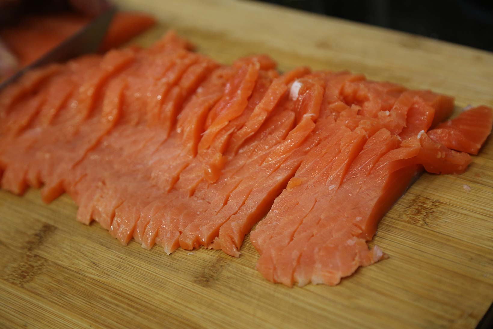 Slicing salted salmon