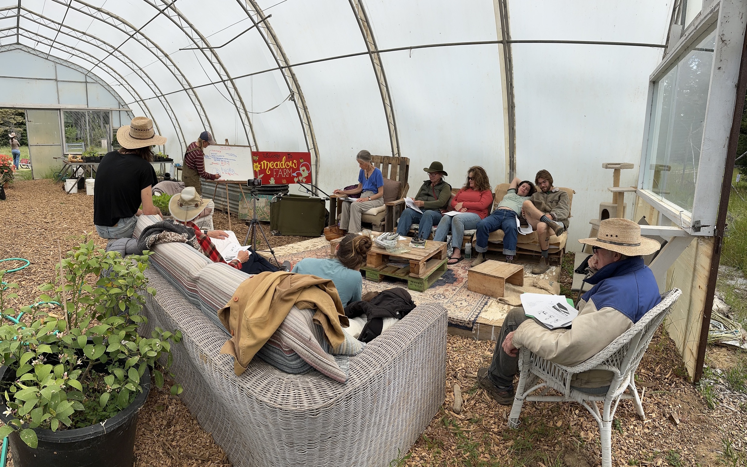 Sydney Grange teaches a group about planting quinoa.