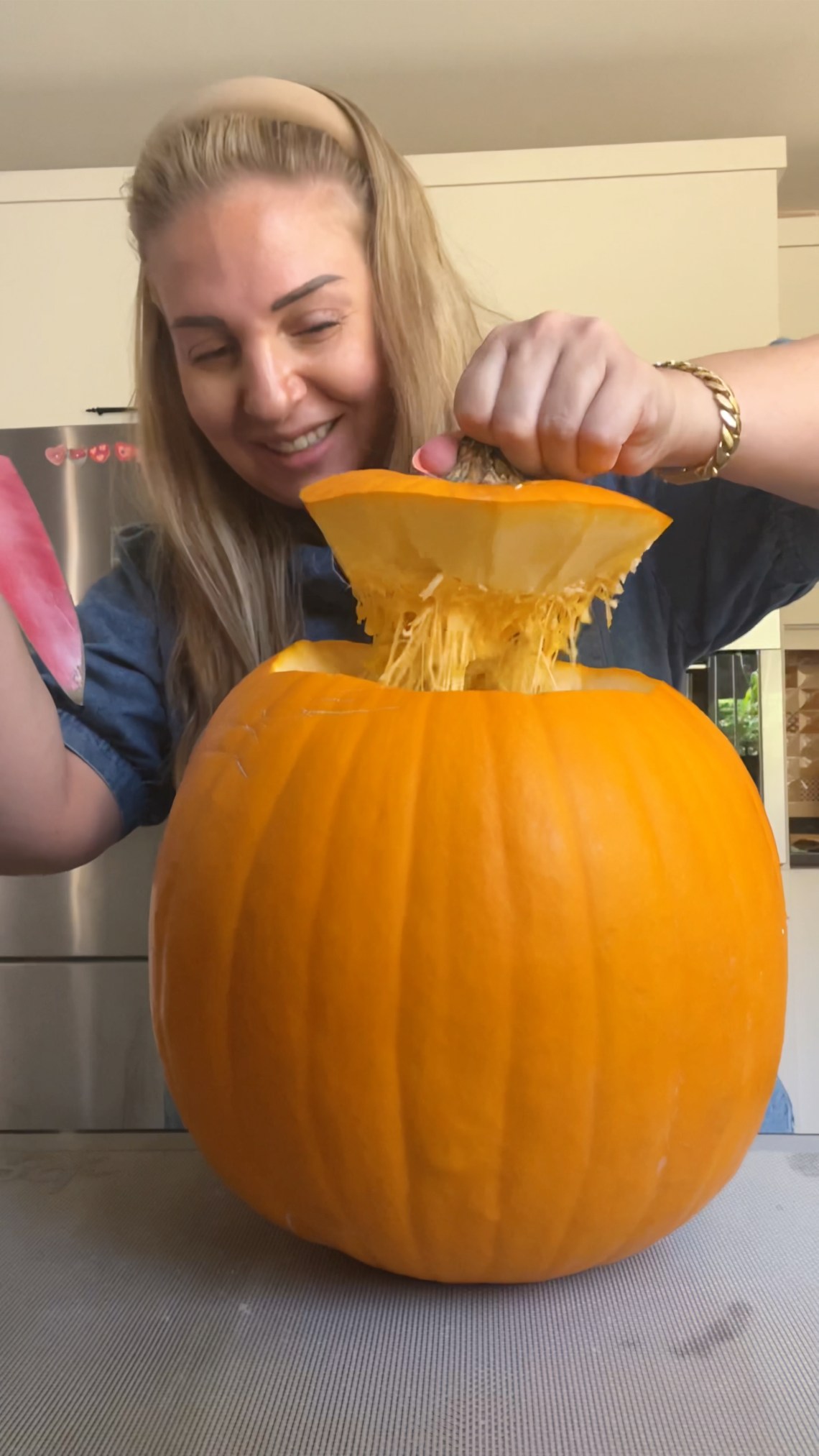 Large pumpkin hollowed out and ready for stuffing with basmati rice