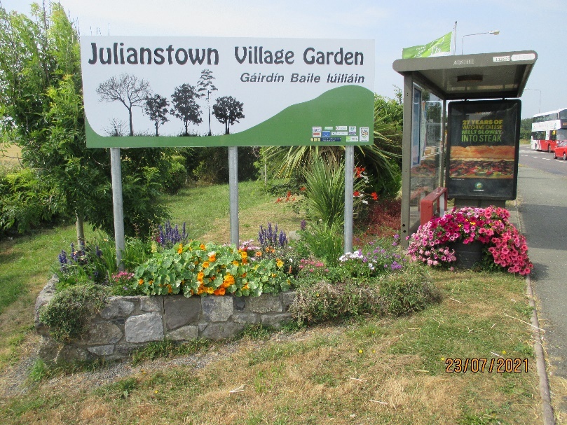 A sign on the side of a road Description automatically generated with low confidence