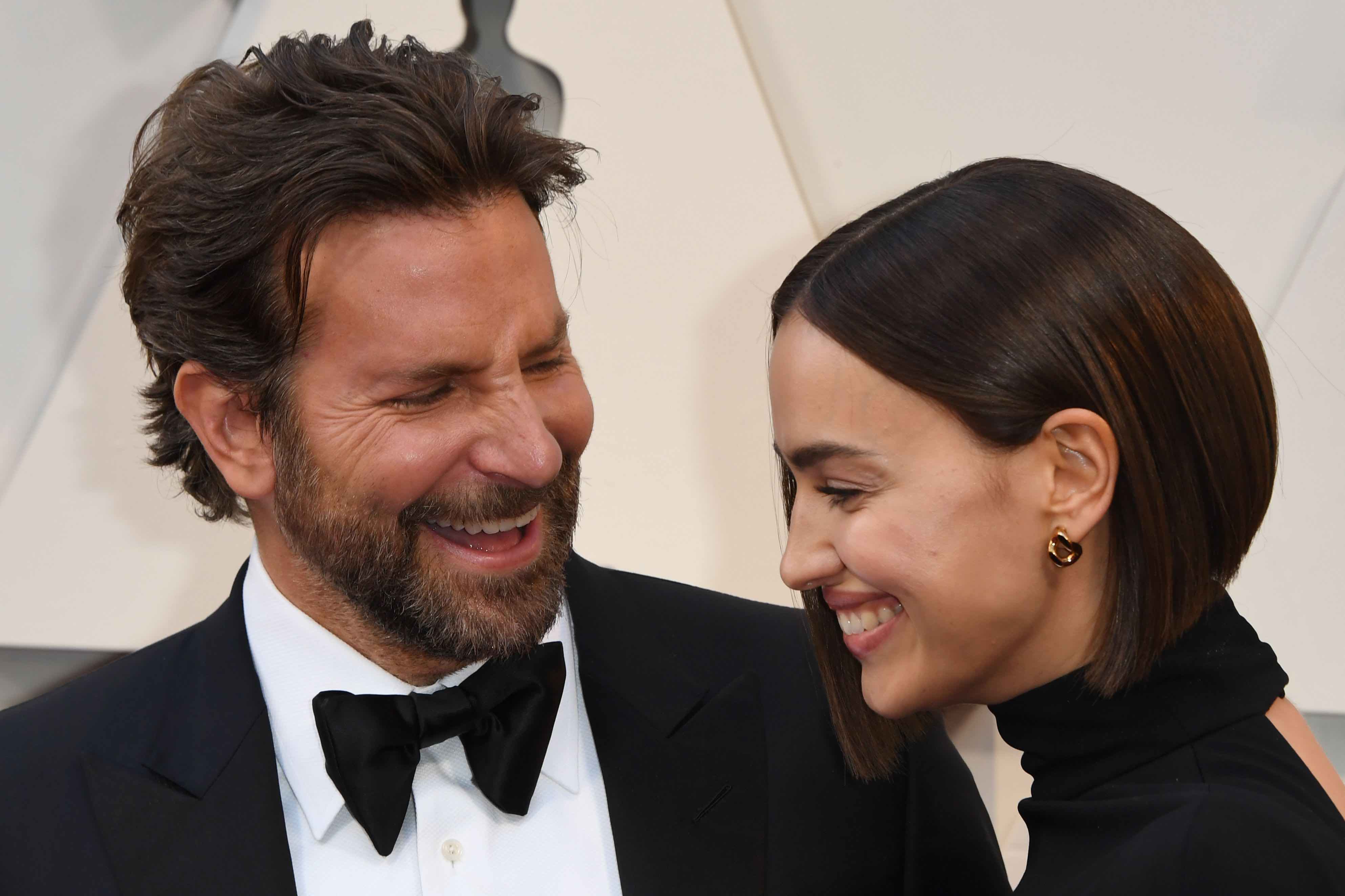 Best Actor nominee for "A Star is Born" Bradley Cooper (L) and his wife Russian model Irina Shayk arrive for the 91st Annual Academy Awards at the Dolby Theatre in Hollywood, California on February 24, 2019. (Photo by Mark RALSTON / AFP) (Photo credit should read MARK RALSTON/AFP/Getty Images)