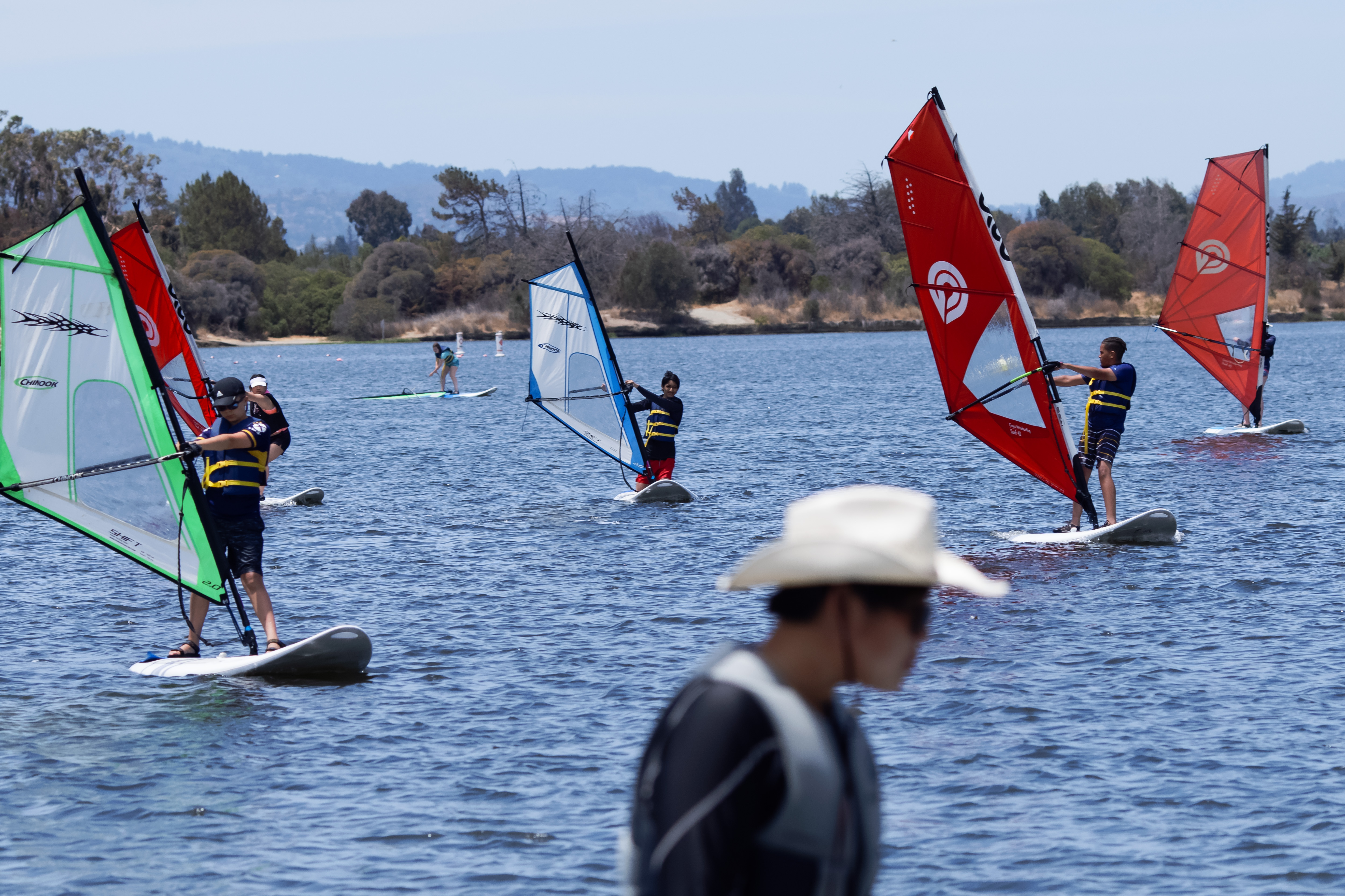 Students learn to windsurf during a windsurfing and sailing summer camp at Shoreline Lake in Mountain View. (Dai Sugano/Bay Area News Group)