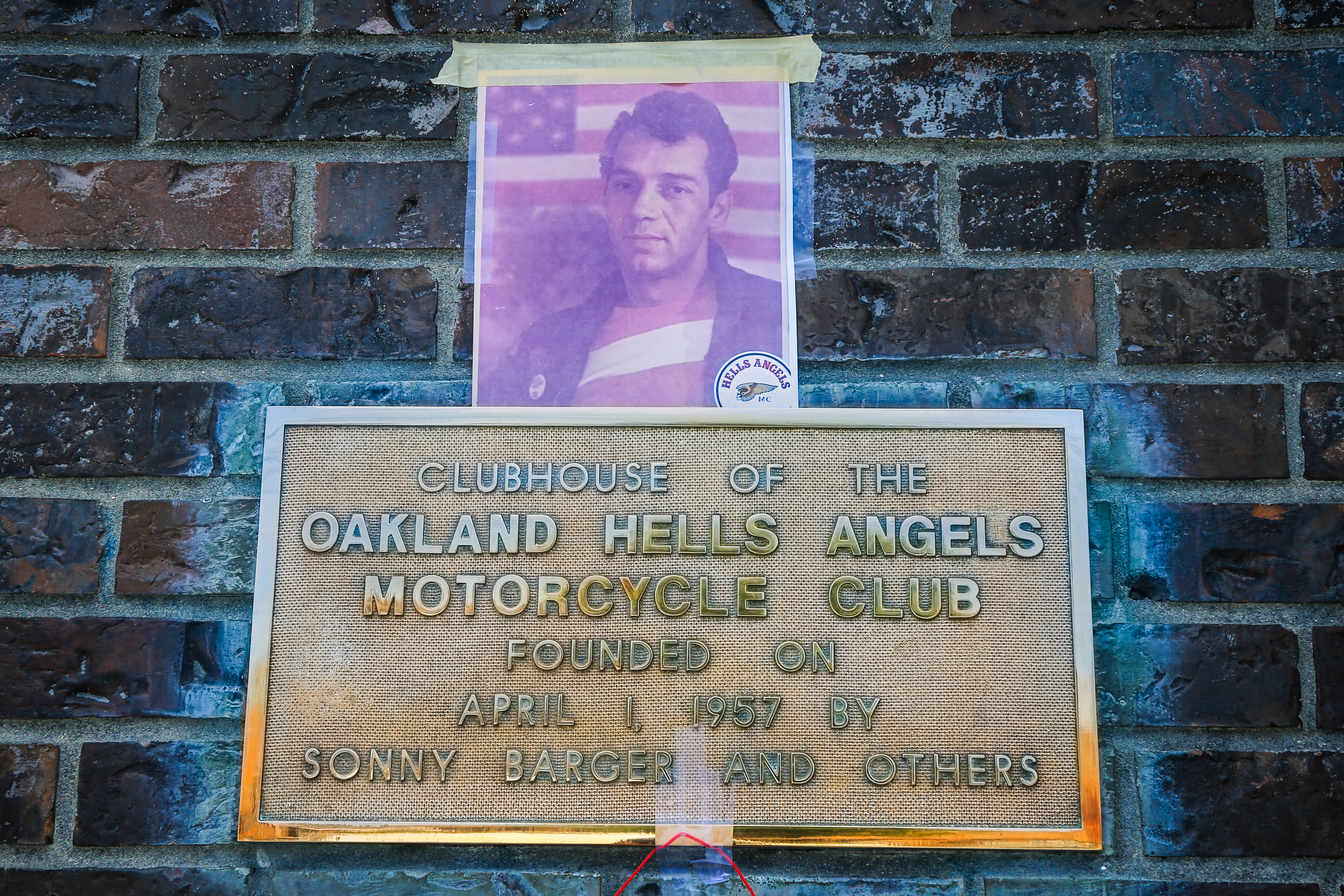 OAKLAND, CALIFORNIA - JUNE 30: A makeshift memorial in honor of Sonny Barger, founder of the Hells Angels, is set outside the Hells Angles Motorcycle Club Oakland chapter on Foothill Boulevard in Oakland, Calif., on Thursday, June 30, 2022. Barger died of cancer at 83, according to his official Facebook page. (Ray Chavez/Bay Area News Group)