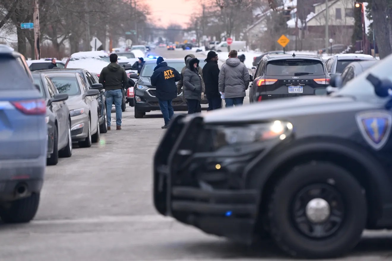 Detroit police, Michigan State Police and ATF agents at the scene at West McNicols and Log Cabin on the border of Highland Park and Detroit on Feb. 2, 2023.Early Thursday evening, police had yellow crime scene tape draped across Log Cabin at McNichols, while parked outside were the Detroit Police Mobile Command Center and units from the Michigan State Police, which was leading the investigation, and the U.S. Bureau of Alcohol, Tobacco, Firearms & Explosives. (Robin Buckson, The Detroit News)