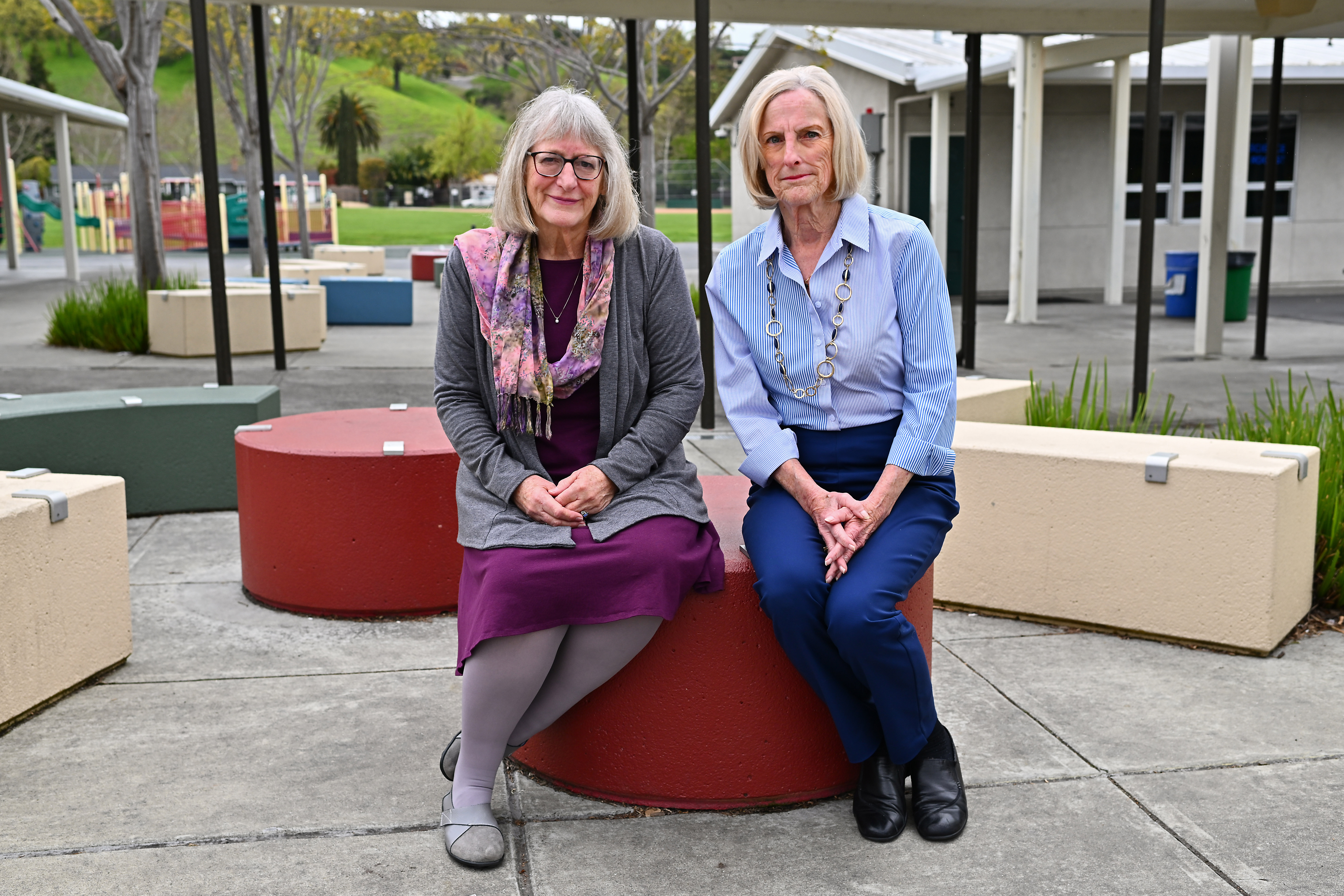 Retired teachers Stephanie Brown-Myers, of Danville, left, and Georgia Moore, of Walnut Creek, are photographed at Green Valley Elementary School in Danville, Calif., on Friday, April 7, 2023. (Jose Carlos Fajardo/Bay Area News Group)