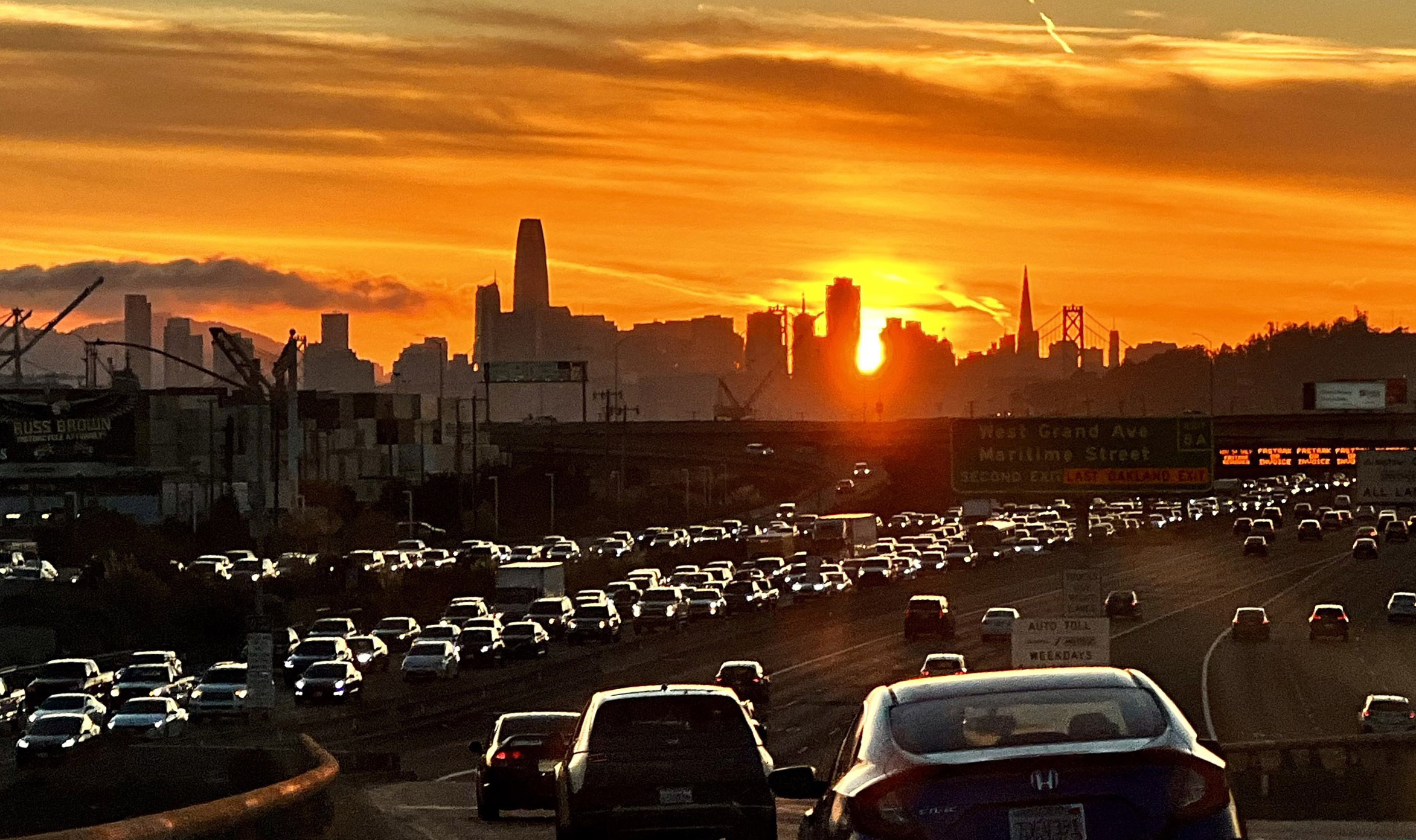 The sun sets behind the San Francisco skyline during rush hour on I-580 in Oakland, Calif., on Thursday, Nov. 10, 2022. (Ray Chavez/Bay Area News Group)