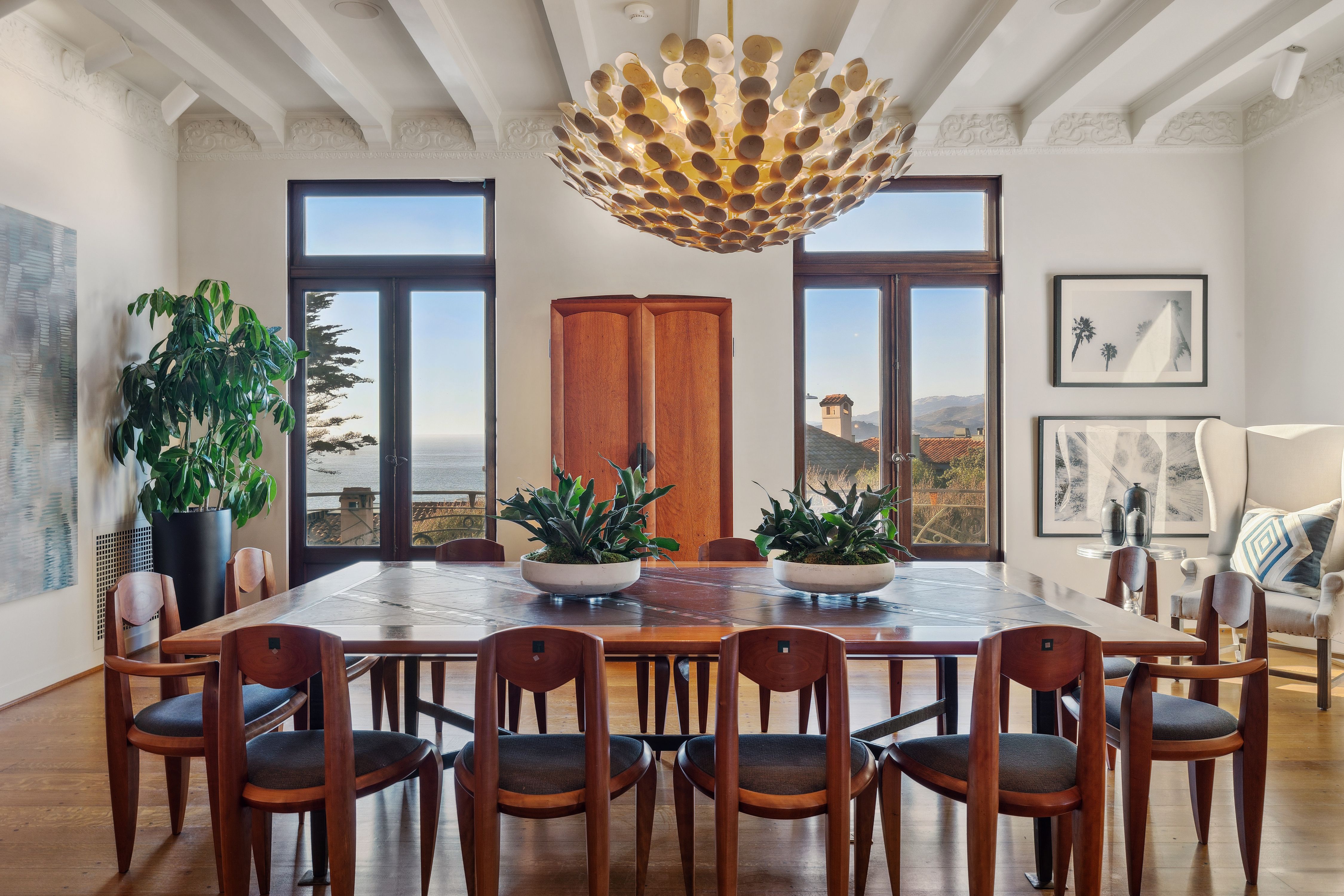 Classic dining room with exposed beamed ceilings.