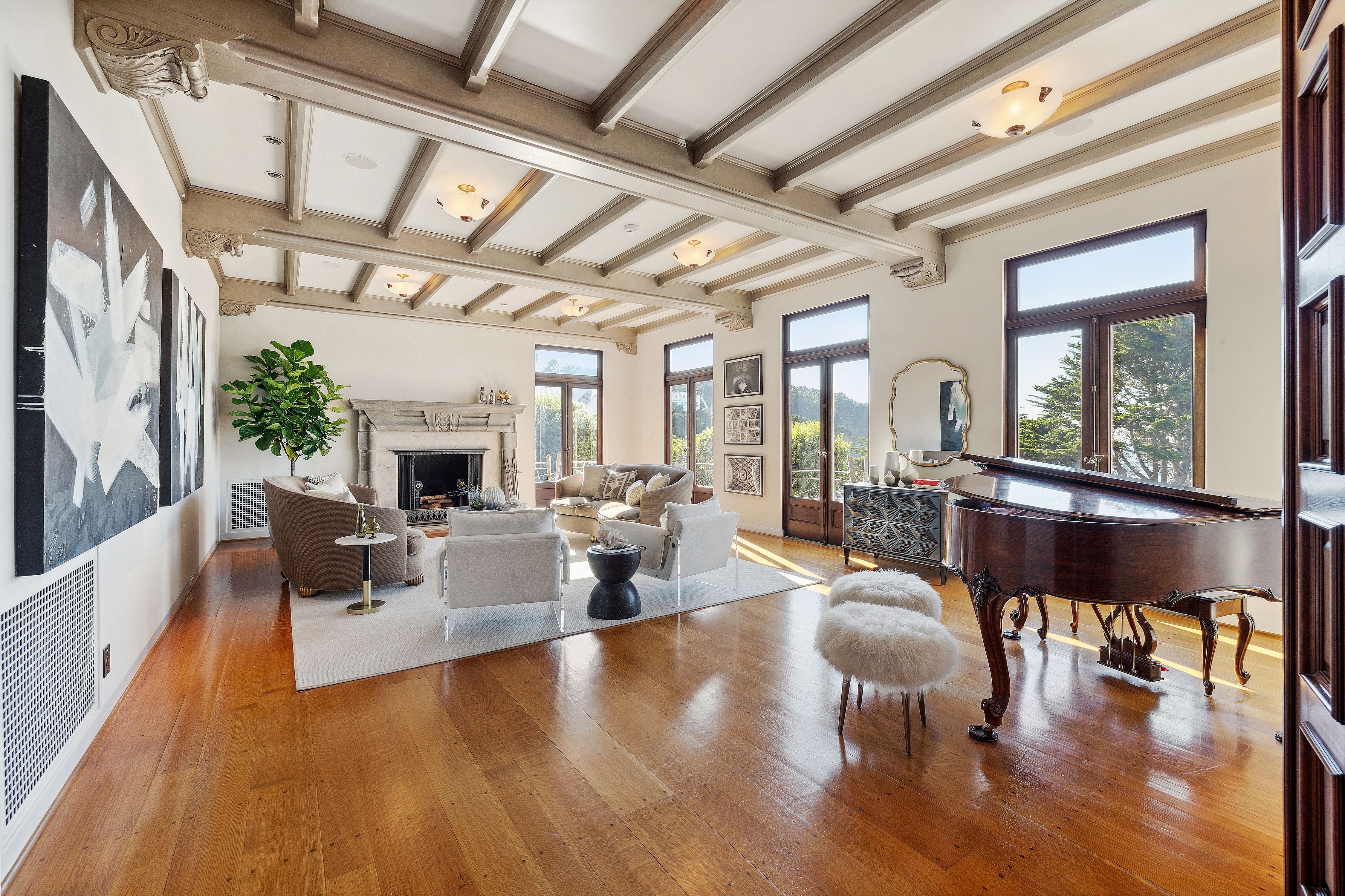 Grand room with exposed beamed ceilings.