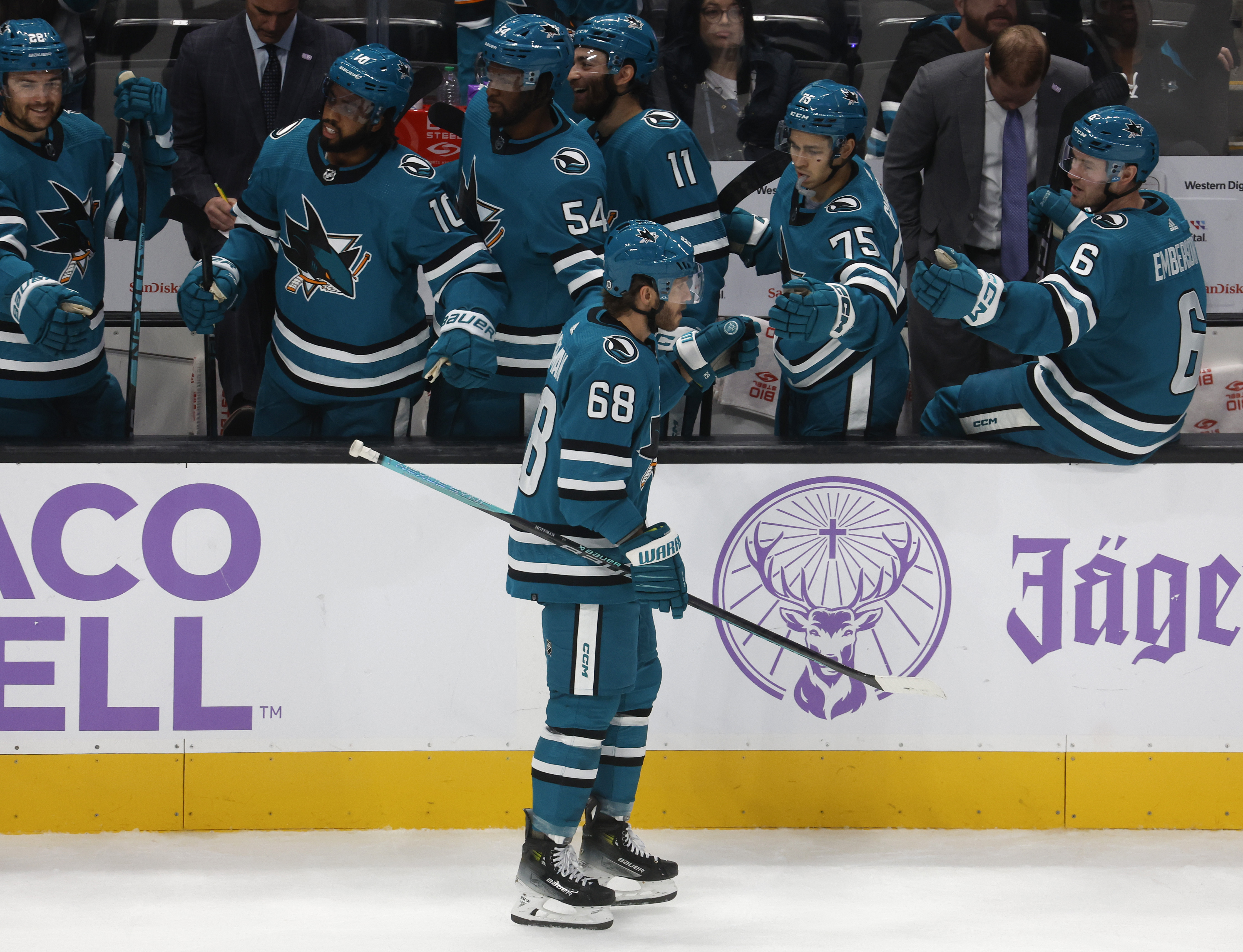 San Jose Sharks' Mike Hoffman (68) high-fives teammates after scoring his second goal of the game against the St. Louis Blues in the second period at the SAP Center in San Jose, Calif., on Thursday, Nov. 16, 2023. (Nhat V. Meyer/Bay Area News Group)