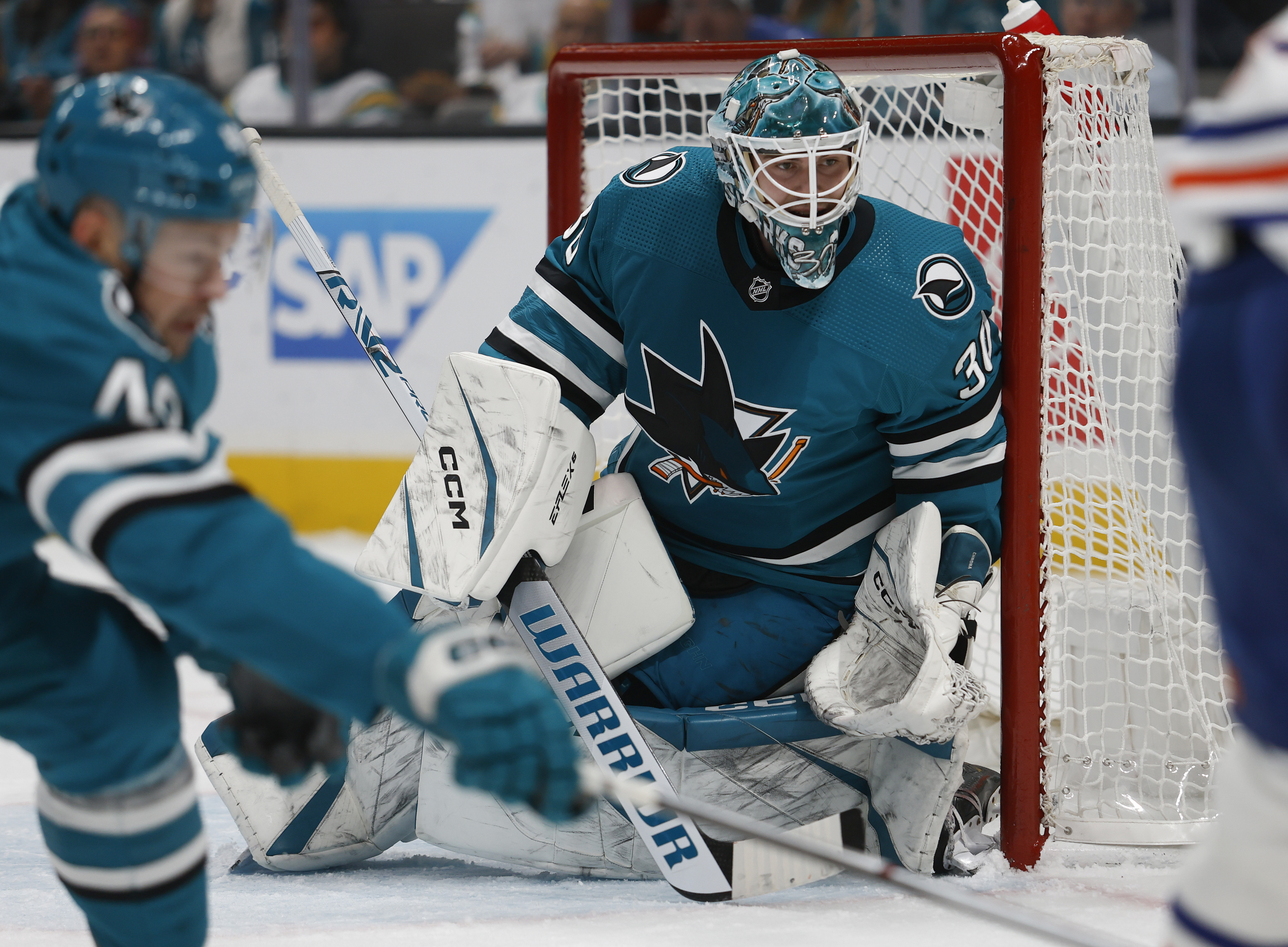 San Jose Sharks goaltender Magnus Chrona (30) keeps an eye on the puck against the Edmonton Oilers in the first period at the SAP Center in San Jose, Calif., on Thursday, Dec. 28, 2023. (Nhat V. Meyer/Bay Area News Group)