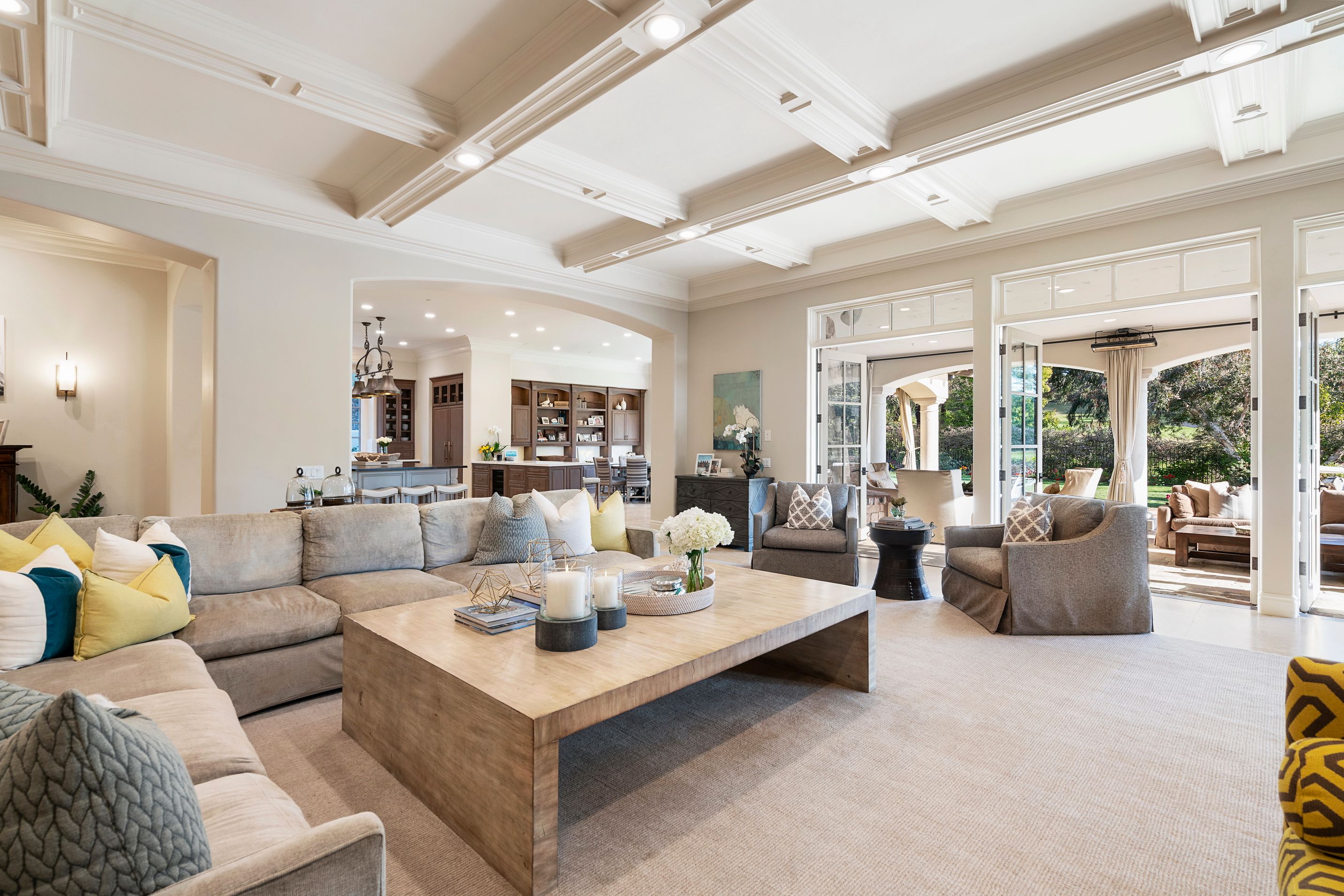 Living room with doors that open to the outdoors area.