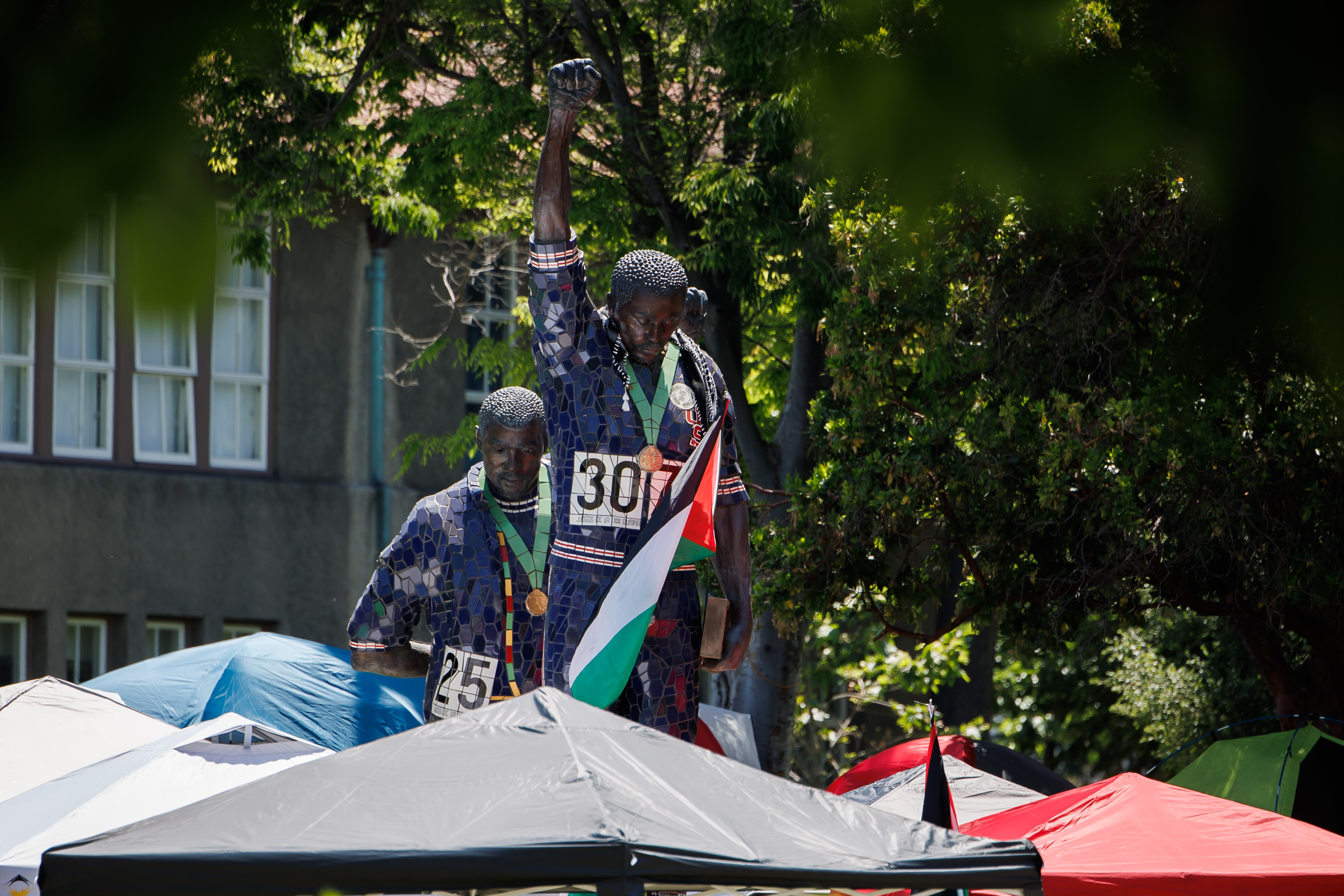 A pro-Palestinian protest encampment is seen in front of the Tommie Smith and John Carlos statues at San Jose State University on Tuesday, May 14, 2024, in San Jose, Calif. (Dai Sugano/Bay Area News Group)