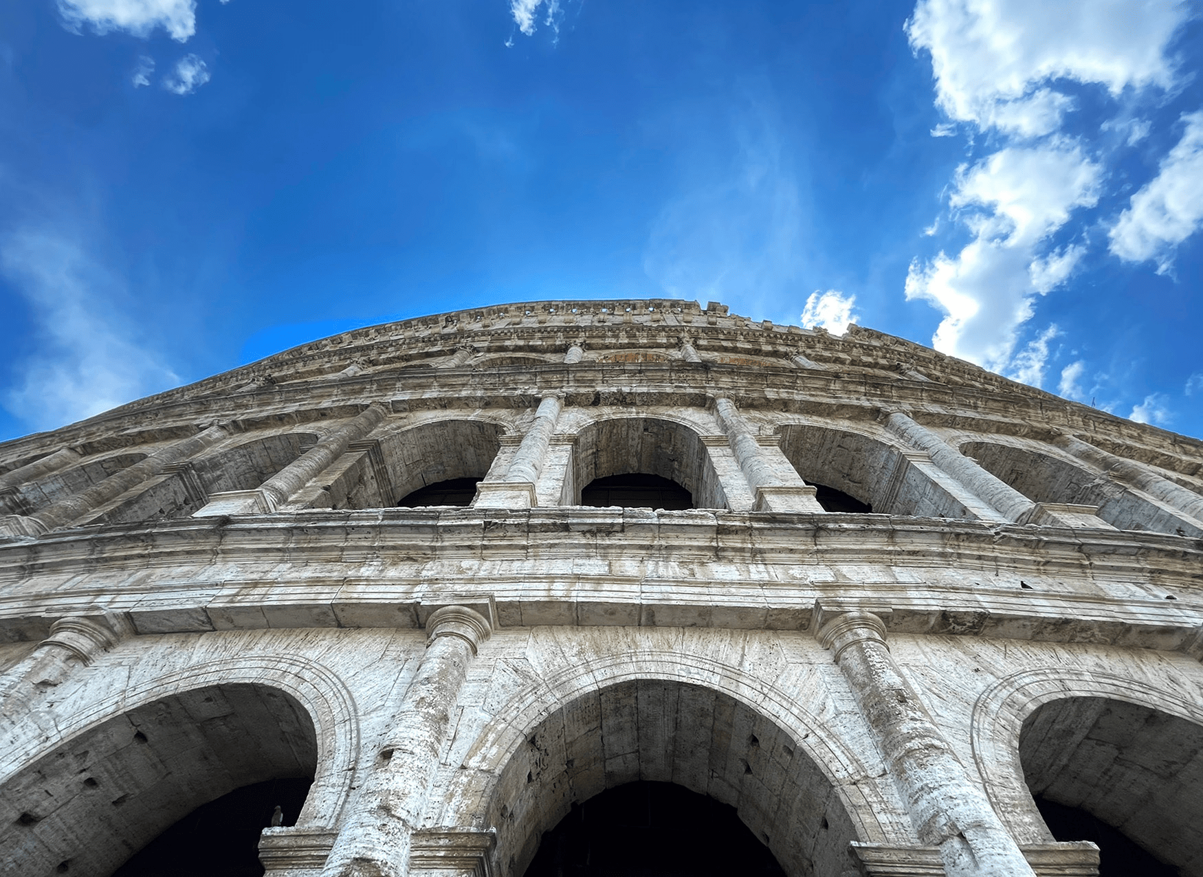Looking up at the Colosseum wall in Rome.