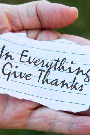 In Everything Give Thanks on note in hands