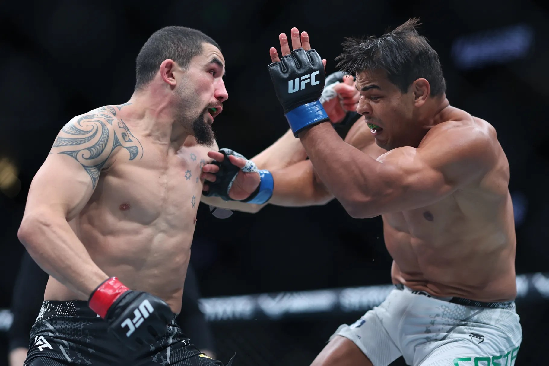 UFC 298: Whittaker sobrevive las patadas de Costa y lo derrota en las tarjetas