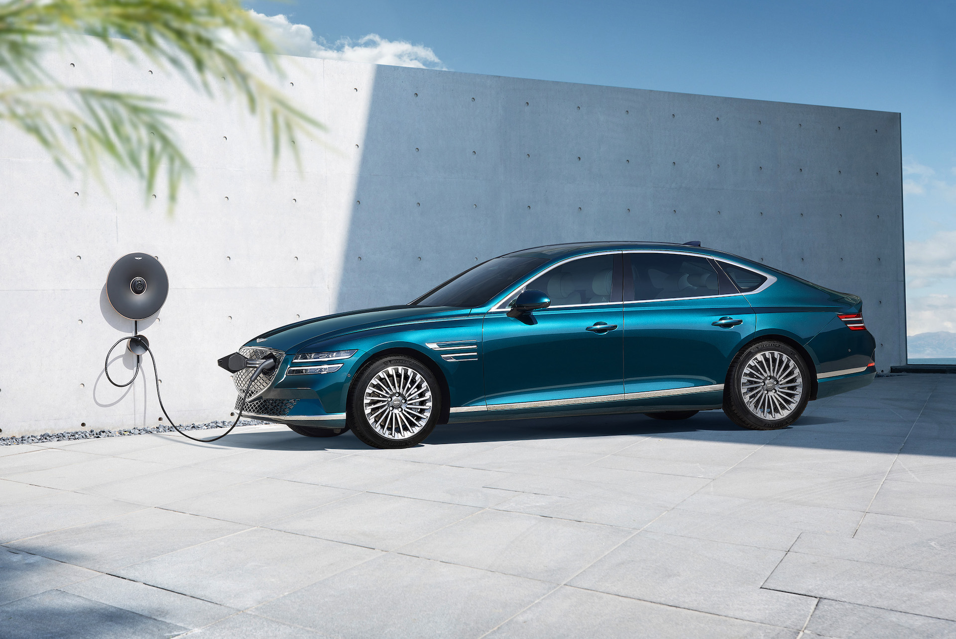 Ultra-sleek 2022 genesis electrified g80 arrives as the brand's first ev