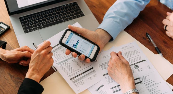 Financial Advisor Discussing Financial Figures