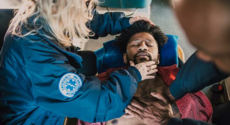 Paramedic performing CPR