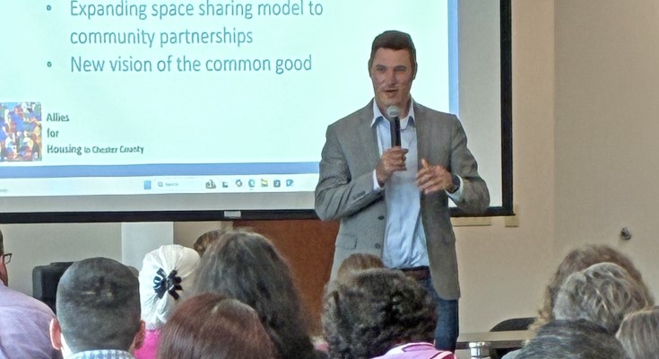 Commissioner Maxwell speaking at Housing Summit