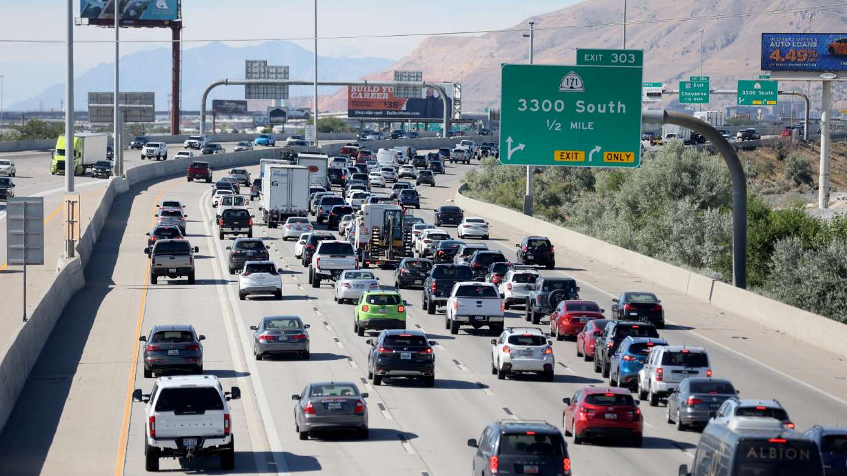 Traffic moves along I-15 in South Salt Lake during rush hour on June 29. Utah transportation officials say Labor Day