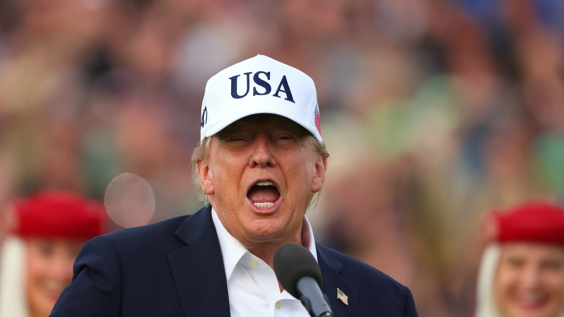 U.S. President Donald Trump speaks to the crowd during the Irish Open at the Trump International Golf Links course in