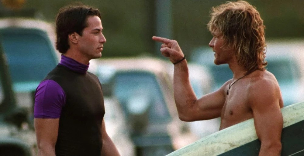 POINT BREAK, from left: Keanu Reeves, Patrick Swayze, 1991. © Fathom Entertainment / courtesy Everett Collection