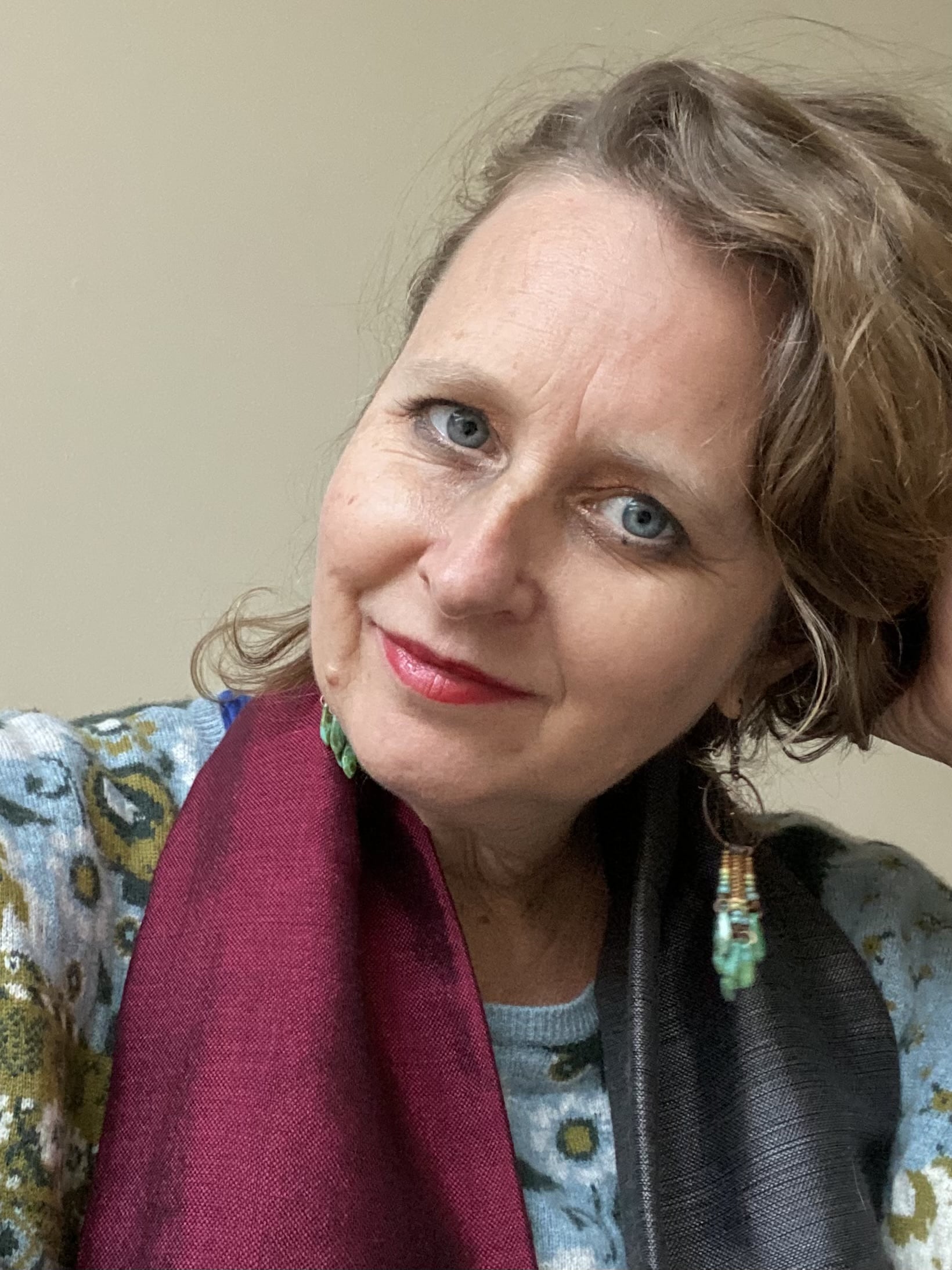 Sarah Riggs with earings and scarf