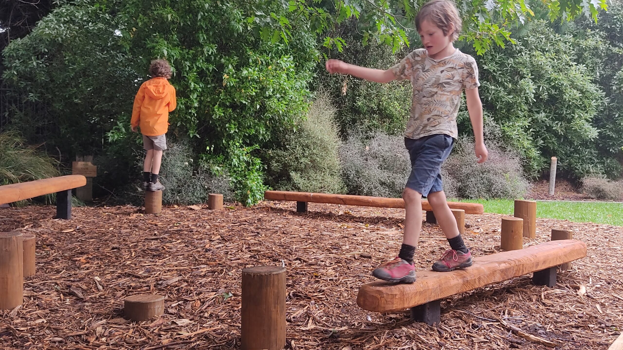 kids playing on adventure playground