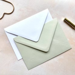 Two envelopes in white and pale grey