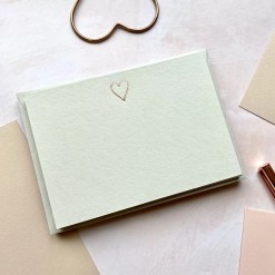 Grey notecards and envelopes with a heart design
