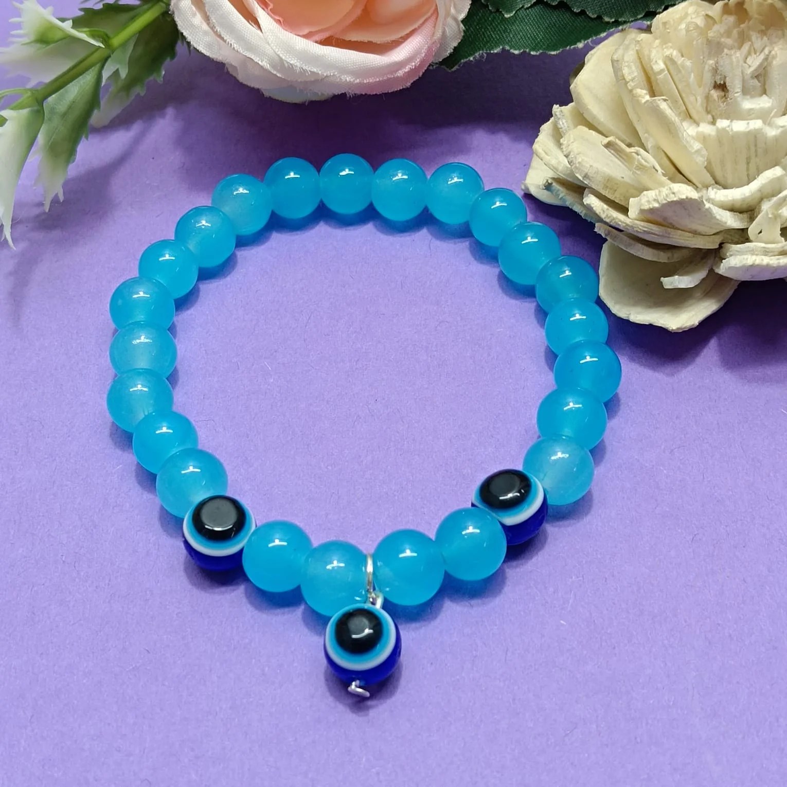 Blue Beaded Bracelet with Evil Eye Charms