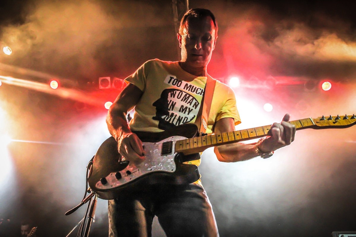 James Reyne performing live on stage
