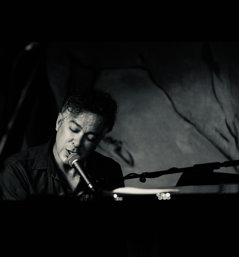 M. Ward performing on stage during his Australian tour.