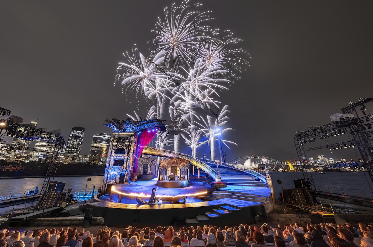 The Phantom Of The Opera Stage Over Sydney Harbour, with the Sydney Opera House in the background.