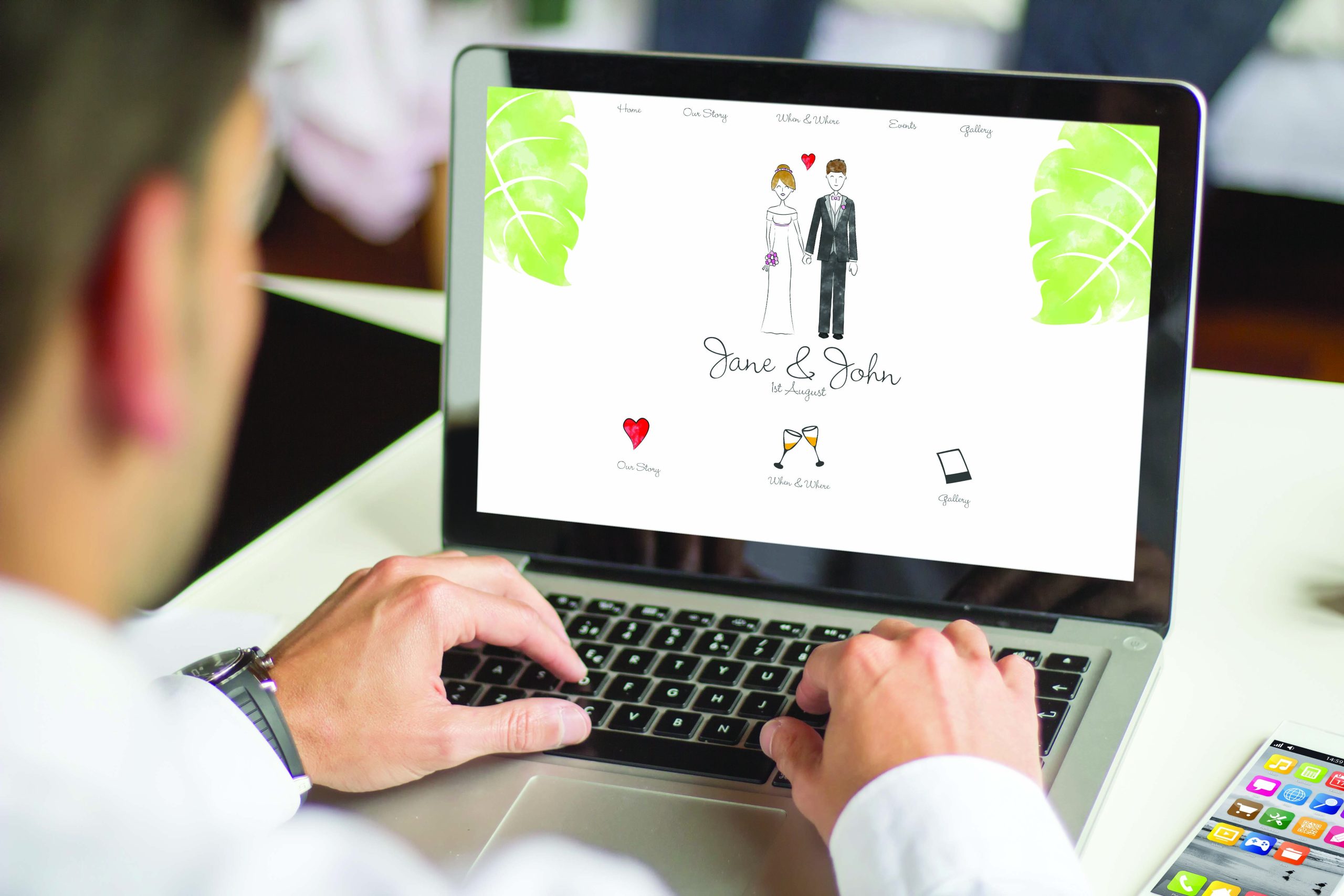 Businessman browsing wedding website with a laptop.