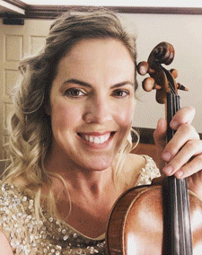 Jessica Guideri holding a violin.
