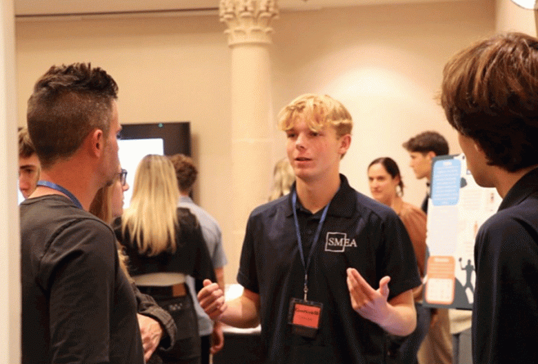 SMEA student Ethan Ball pitches the CoachLink SB to MOS Equipment CEO Ryan Judy. (Photo by Taylor Bronson)