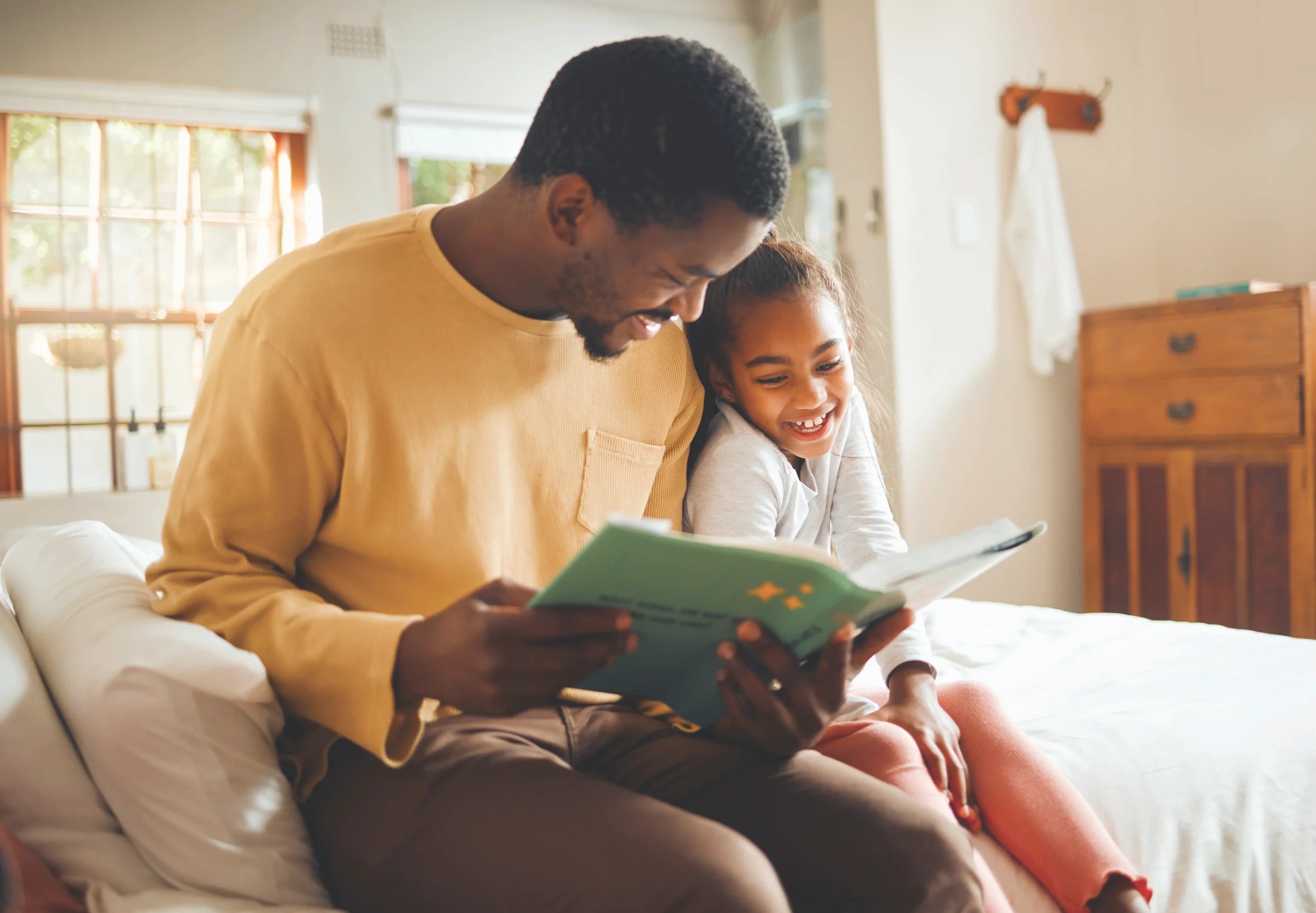 Family bonding through shared stories and smiles.