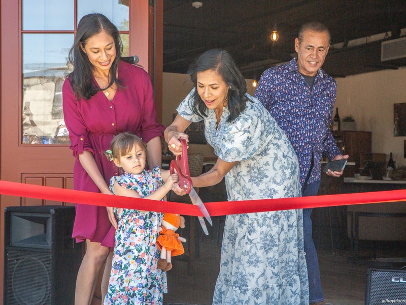Dahlia Guerrero, left, daughter Serena Zate, Sandra Guerrero and Ramon Guerrero cut the ribbon during Amada Cellars’ April grand opening in Los Alamos.