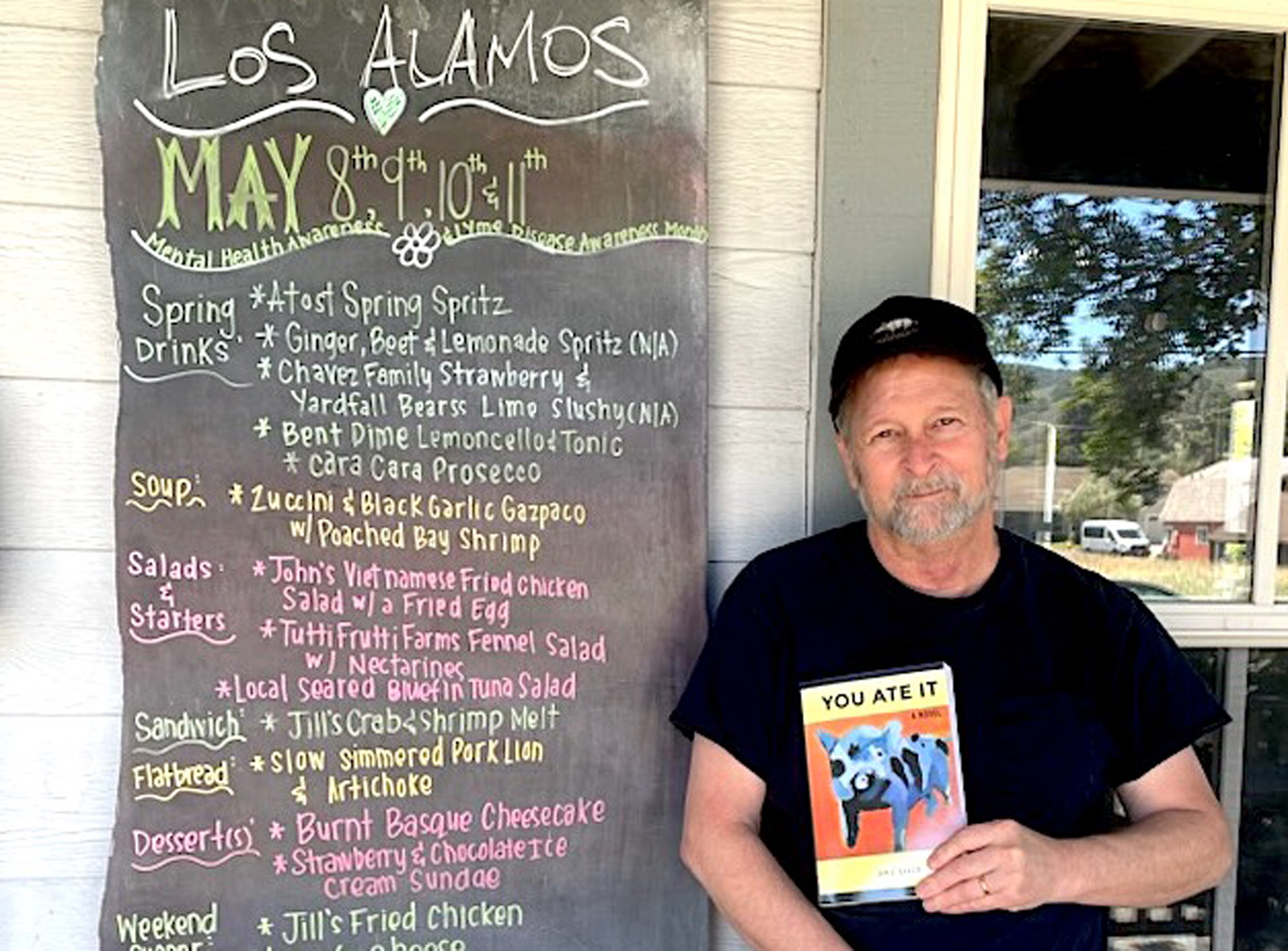 Author Jamie Baker stands outside Full of Life Flatbread in Los Alamos, where he treated himself to Sunday dinners after meeting his weekly word-count goal while crafting his “You Ate It" novel.