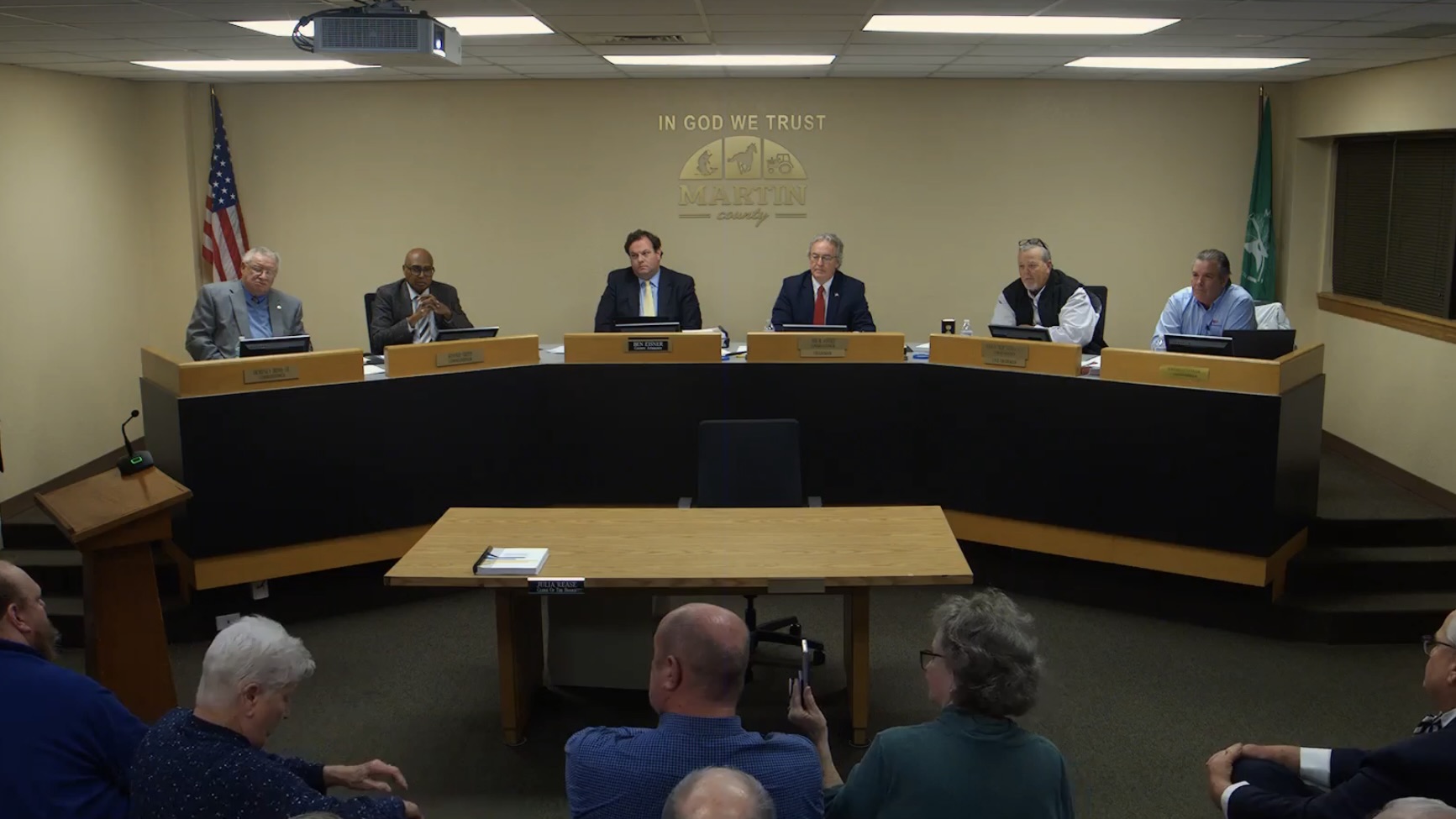 Members of the Martin County Board of Commissioners seated at a dais during a meeting on Feb. 12, 2025. The board is working to reopen the shuttered Martin General Hospital as a Rural Emergency Hospital.