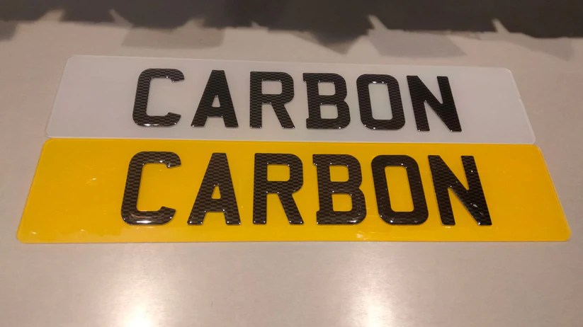 Carbon fiber number plate for cars with modern, lightweight design and durability.