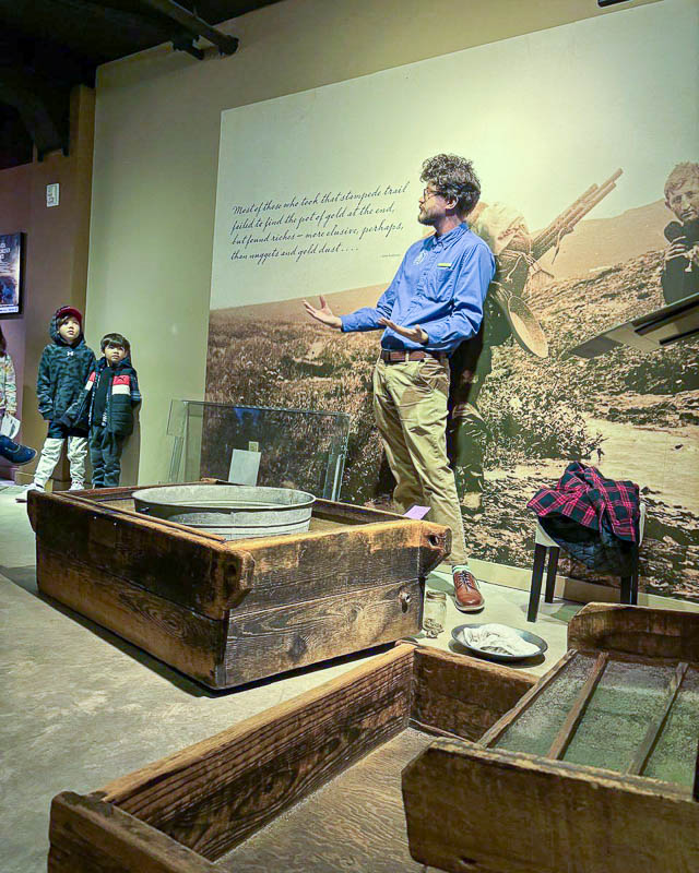 Artiom (Interpretation and Education Intern at Klondike National Historical Park) - Giving an interpretive presentation in front of the gold panning station.